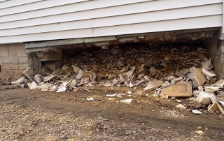 An unexpected historical artifact uncovered by volunteers under a Spencer County Habitat for Humanity home build.